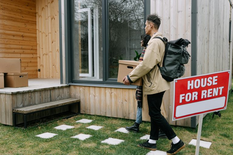 Man walking into his a rental properties